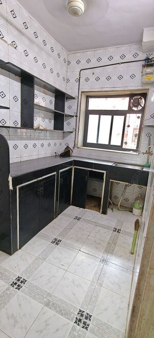 Kitchen in 1 BHK Apartment at United Unity Heights, Malad West – for Rent