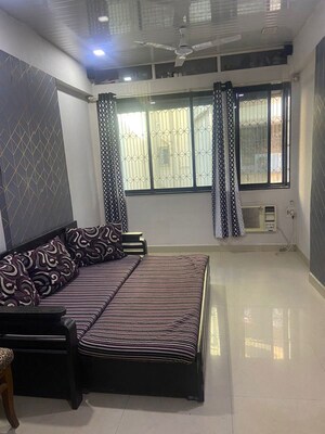 Living Room in 1 BHK Apartment at Versova View, Andheri West – for Rent