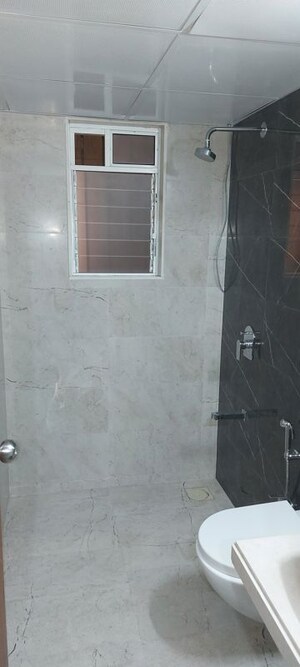 Bathroom in 1.5 BHK Apartment at Dosti West County, Balkum Pada – for Rent
