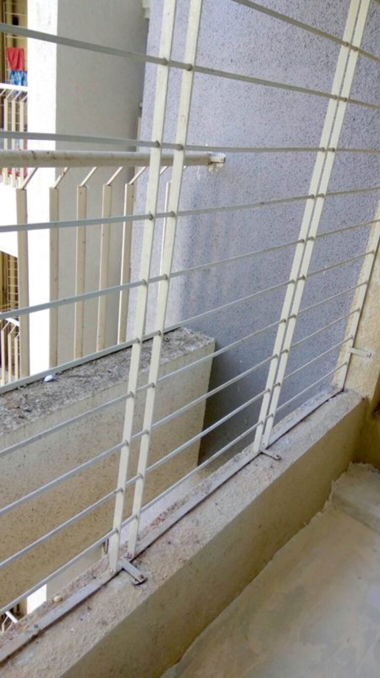 Balcony, unique-poonam-estate-cluster-2 2 Bedroom 674 Sq.Ft. Apartment In Mira Road Thane 10143658