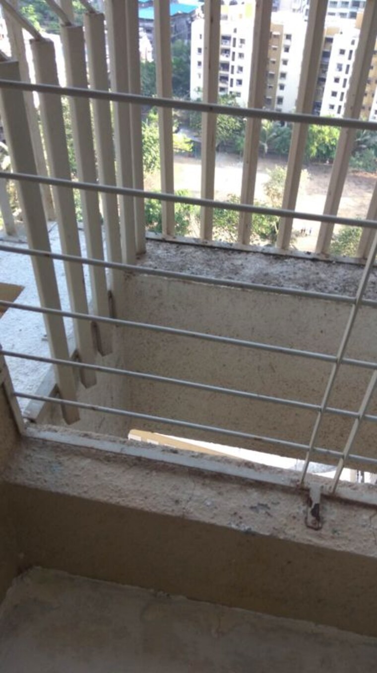 Balcony, unique-poonam-estate-cluster-2 2 Bedroom 674 Sq.Ft. Apartment In Mira Road Thane 10143658