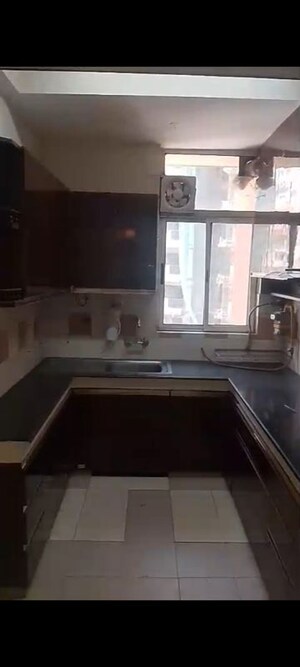 Kitchen in 3 BHK Apartment at Ashiana Palm Court, Raj Nagar Extension – for Sale