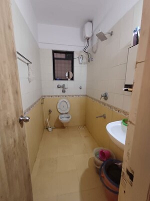 Bathroom in 2 BHK Apartment at Raunak Laxmi Narayan Residency, Pokhran Road No Two – for Rent