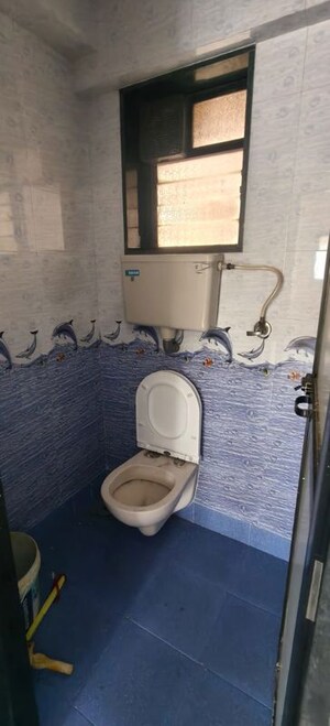 Bathroom in 2 BHK Apartment at Air India Colony, Nerul – for Rent