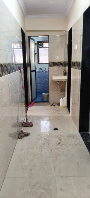 Building Lobby in 2 BHK Apartment at Air India Colony, Nerul – for Rent