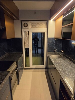 Kitchen in 2 BHK Apartment at Rustomjee Azziano Wing D, Thane West – for Rent