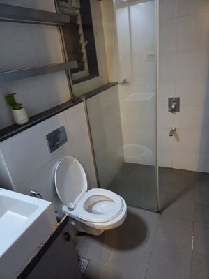 Bathroom in 2 BHK Apartment at Rustomjee Azziano Wing D, Thane West – for Rent