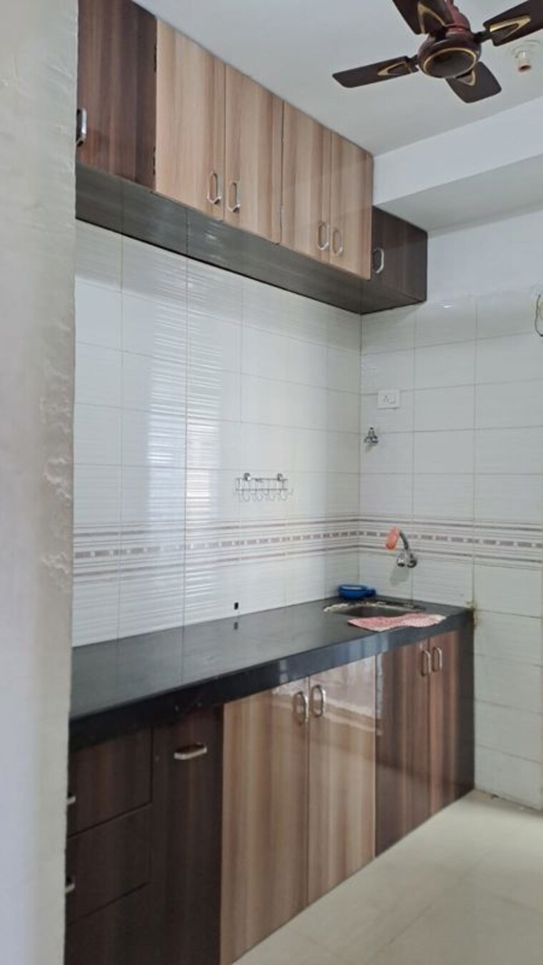 Kitchen, tanvi-eminence-phase-ii 1 Bedroom 785 Sq.Ft. Apartment In Mira Road Thane 10143712