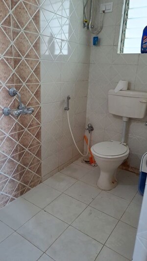 Bathroom in 1 BHK Apartment at Tanvi Eminence Phase II, Mira Road – for Rent
