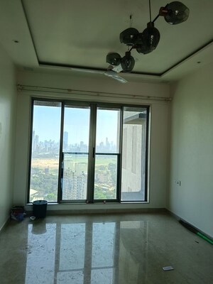 Living Room in 2 BHK Apartment at Chandak Cornerstone, Worli – for Rent