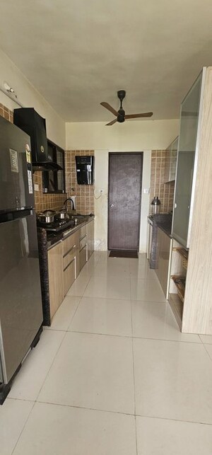 Kitchen in 2 BHK Apartment at Om Tropica, Ravet – for Sale