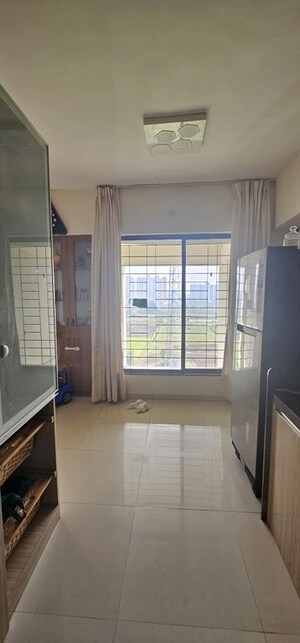 Living Room in 2 BHK Apartment at Om Tropica, Ravet – for Sale