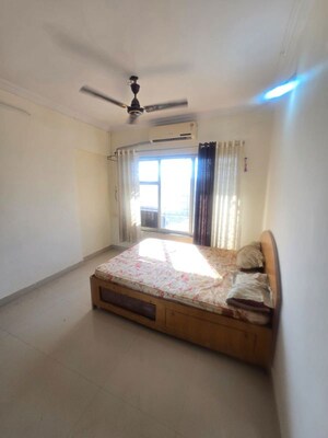 Bedroom in 2 BHK Apartment at Andheri CHS, Andheri West – for Rent