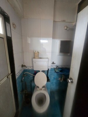 Bathroom in 2 BHK Apartment at Andheri CHS, Andheri West – for Rent
