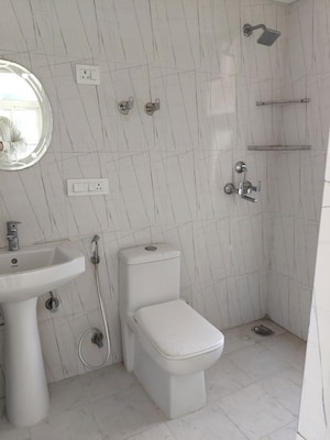 Bathroom in 2 BHK Apartment at Nilaya Greens, Raj Nagar Extension – for Sale