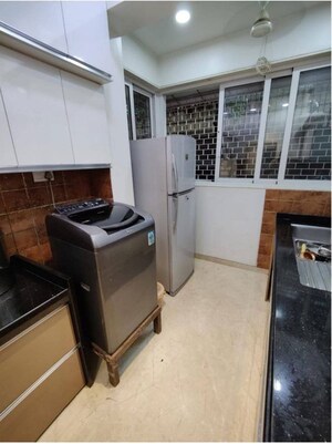 Kitchen in 2 BHK Apartment at Chandak Ideal, Juhu – for Rent