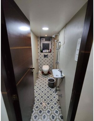 Bathroom in 2 BHK Apartment at Chandak Ideal, Juhu – for Rent