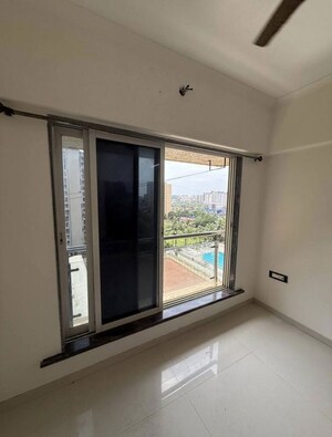 Room in 2 BHK Apartment at Nirmal Anand CHS, Andheri West – for Rent