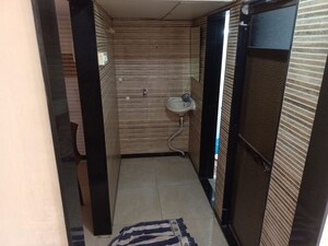 Bathroom in 1 BHK Apartment at Nagari Niwara CHS, Goregaon East – for Rent