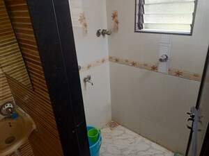 Bathroom in 1 BHK Apartment at Nagari Niwara CHS, Goregaon East – for Rent