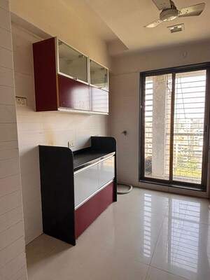 Kitchen in 2 BHK Apartment at Reliable Balaji Heights, Nerul – for Rent