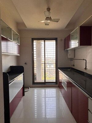 Kitchen in 2 BHK Apartment at Reliable Balaji Heights, Nerul – for Rent