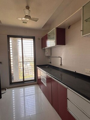 Kitchen in 2 BHK Apartment at Reliable Balaji Heights, Nerul – for Rent
