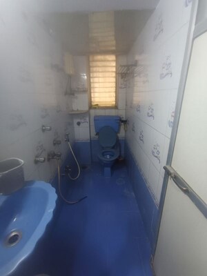Bathroom in 2 BHK Apartment at Haridwar CHS Malad, Malad West – for Rent