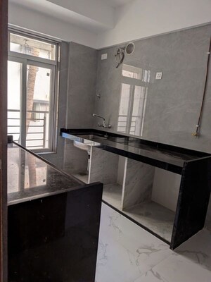 Kitchen in 2 BHK Apartment at Jain Shree Pandurang Gore Complex, Goregaon East – for Rent