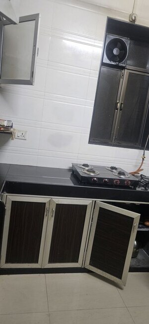 Kitchen in 2 BHK Apartment at Kakad Estate Worli, Worli – for Rent