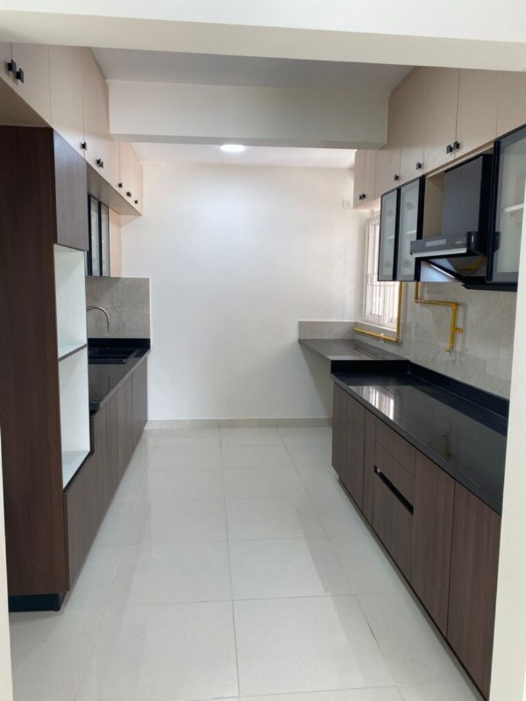 Kitchen, brigade-cornerstone-utopia 2.5 Bedroom 1404 Sq.Ft. Apartment In Varthur Bangalore 10144305
