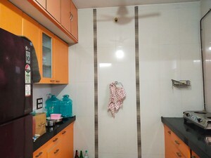 Kitchen in 3 BHK Apartment at Dedhai Platinum Petals, Ghodbunder Road – for Sale