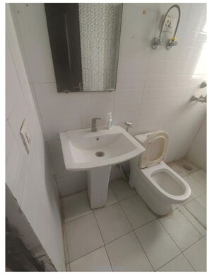 Bathroom in 3 BHK Apartment at Aims Golf Avenue II, Sector 75 – for Sale