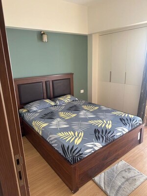 Bedroom in 3 BHK Apartment at Godrej Woods, Sector 43 – for Rent