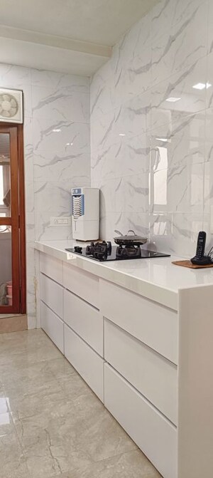 Kitchen in 2.5 BHK Apartment at Hiranandani Cardinal, Ghodbunder Road – for Sale