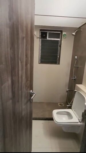 Bathroom in 2 BHK Apartment at Harasiddh Viraaj, Malad East – for Rent