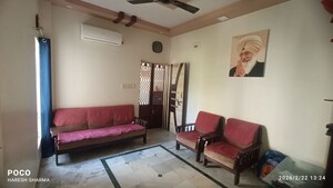 Living Room in 2 BHK Apartment at Krishna Nagar – for Sale