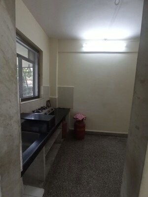 Bathroom in 1 BHK Apartment at Roop Varsha CHS, Andheri East – for Sale