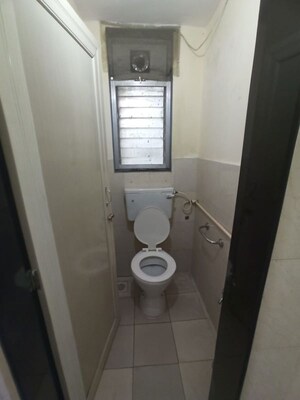 Bathroom in 1 BHK Apartment at Roop Varsha CHS, Andheri East – for Sale