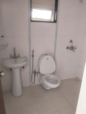 Bathroom in 3 BHK Apartment at Kolte Patil Margosa Heights, Mohammadwadi – for Rent