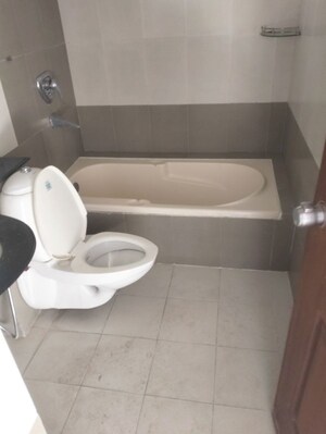 Bathroom in 3 BHK Apartment at Kolte Patil Margosa Heights, Mohammadwadi – for Rent