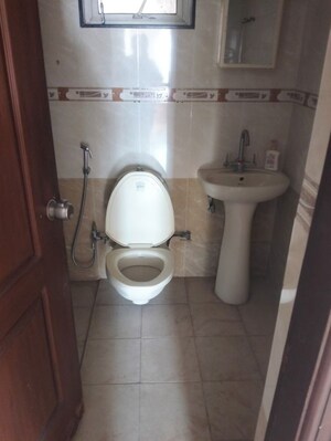 Bathroom in 3 BHK Apartment at Kolte Patil Margosa Heights, Mohammadwadi – for Rent