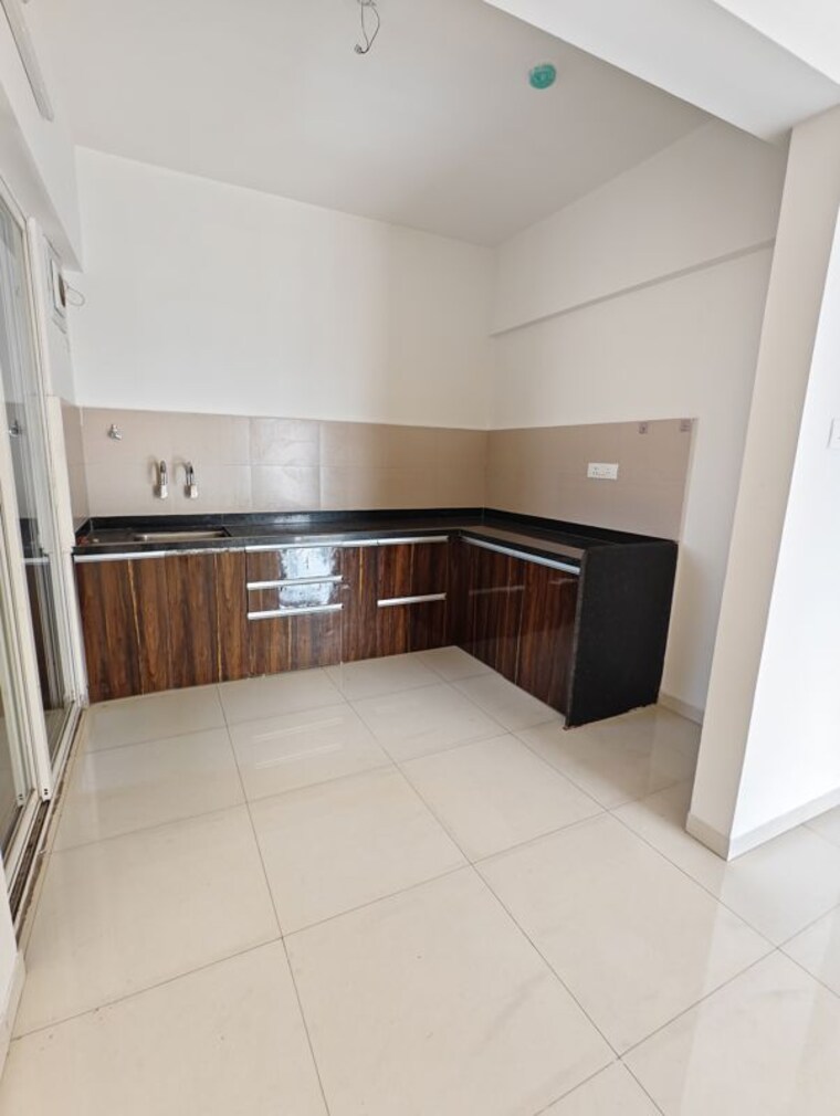 Kitchen, mantra-monarch 3 Bedroom 1000 Sq.Ft. Apartment In Balewadi Pune 10144796