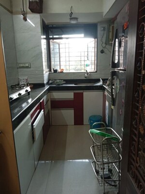 Kitchen in 1 BHK Apartment at OM Elegance, Malad West – for Sale