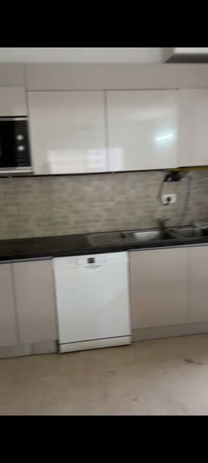 Kitchen in 4 BHK Apartment at Godrej Woods, Sector 43 – for Rent