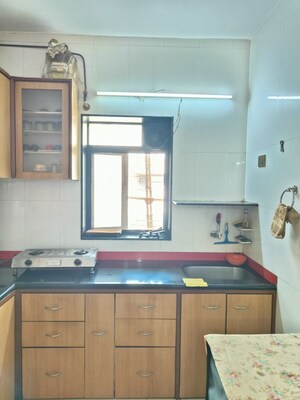 Kitchen in 2 BHK Apartment at Bridge CHS, Vrindavan Society – for Rent