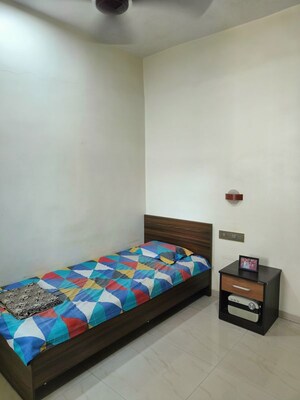 Bedroom in 2 BHK Apartment at Bridge CHS, Vrindavan Society – for Rent