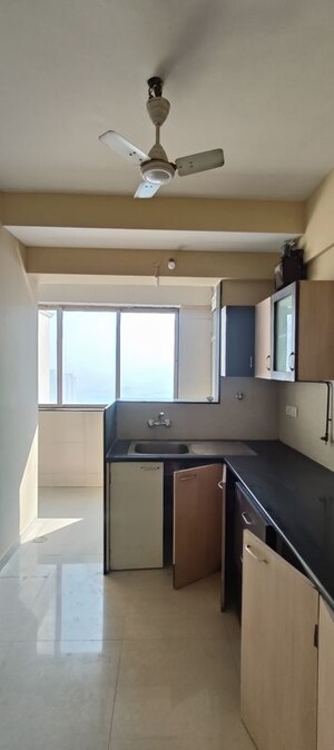 Kitchen in 3 BHK Apartment at Hiranandani Meadows, Manpada – for Rent