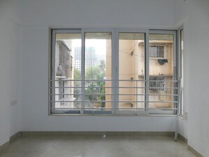 Bedroom in 2 BHK Apartment at Devnani Kailasa, Chembur – for Sale