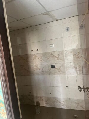 Bathroom in 3 BHK Apartment at Charms Castle, Raj Nagar Extension – for Sale